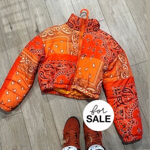 Orange crop bandana puffer jacket.
